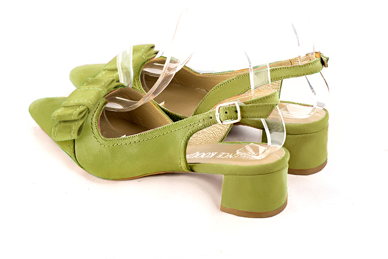 Pistachio green women's open back shoes, with a knot. Tapered toe. Low flare heels. Rear view - Florence KOOIJMAN